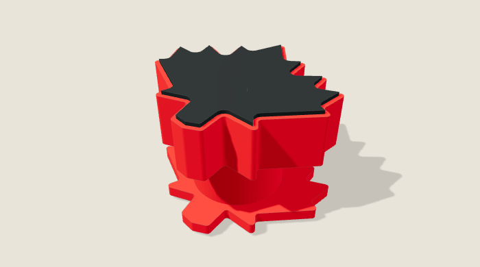 Actual CAD render of the maple-shaped support in its lifted configuration, showing a dark top grip pad, red rigid body, cylindrical spacer and matching maple foot.